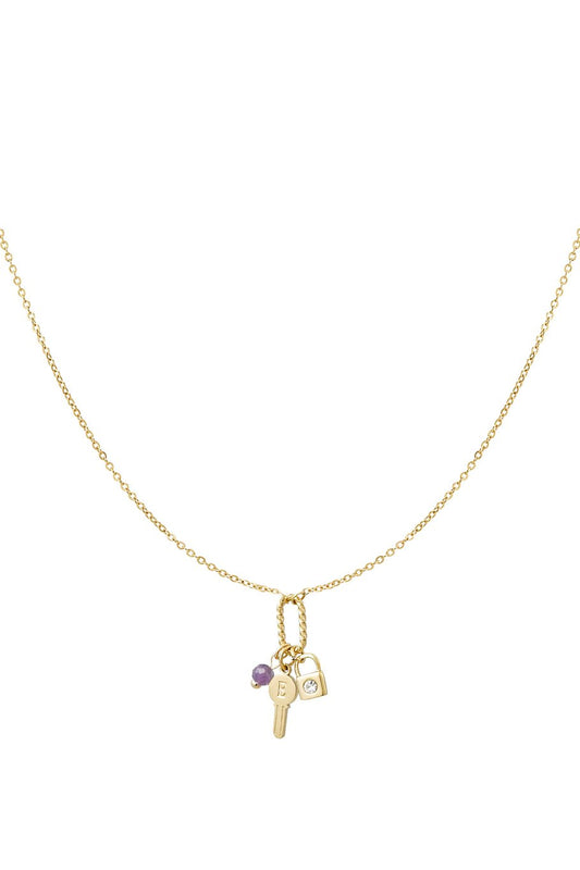 Trendy gouden ketting met paarse steendetail